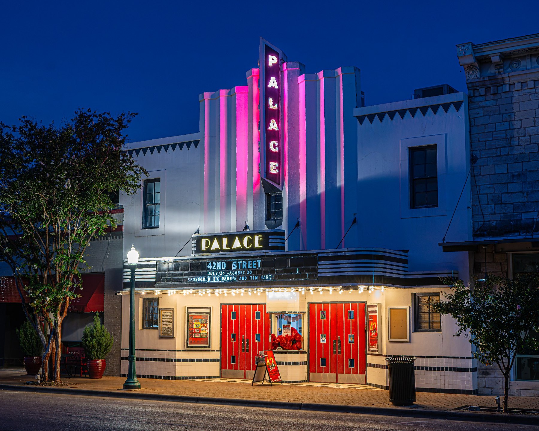 Georgetown Palace Theatre illuminated at night in Georgetown Texas